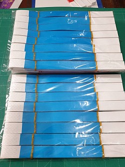 ริสแบนด์กระดาษสีพื้น สีฟ้า สามารถเขียนบนริสแบนด์ได้ ไม่มีขั้นต่ำในการสั่ง โทร. 086-557-5657